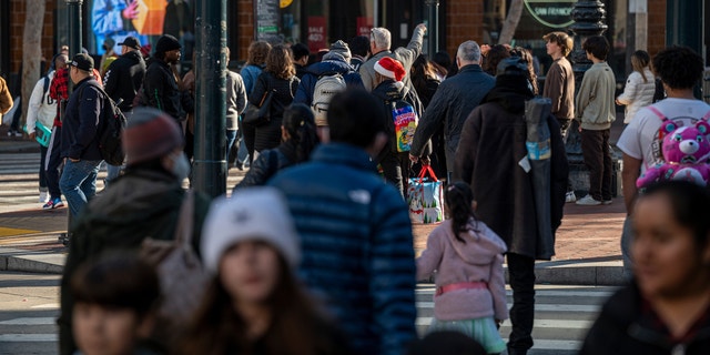 Pedestrians in San Francisco, California, US, on Wednesday, Dec. 21, 2022.