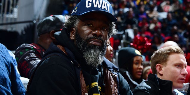 Ed Reed looks on during the game between the Atlanta Hawks and Detroit Pistons at State Farm Arena on December 23, 2022 in Atlanta, Georgia.  