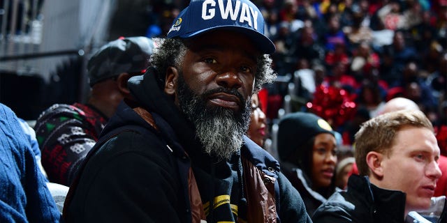 Ed Reed looks on during the game between the Atlanta Hawks and Detroit Pistons at State Farm Arena on December 23, 2022 in Atlanta, Georgia.  