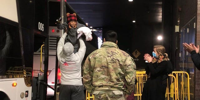Migrants arriving from Del Rio, Texas, disembark a bus at the Port Authority in Manhattan Monday, December 19, 2022. Another bus arriving in New York City from El Paso had a five-day trip through the winter storm disrupting the trip.