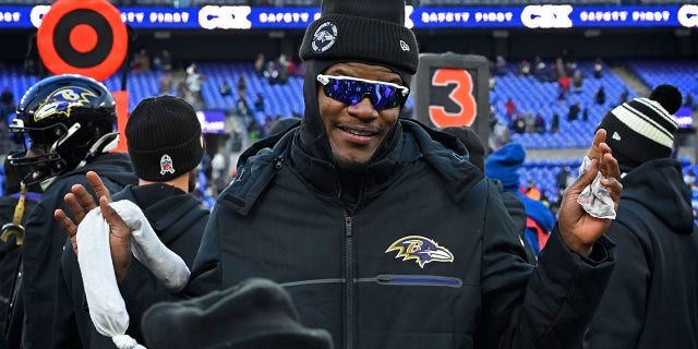 Quarterback Lamar Jackson was on the sideline, cheering his teammates during the Ravens' 17-9 victory over the Atlanta Falcons on Dec. 24, 2022.
