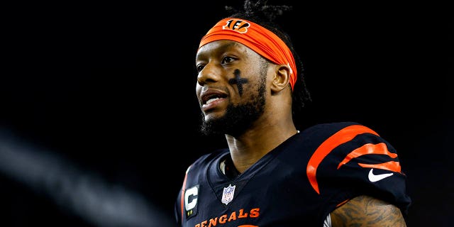 Joe Mixon, #28 of the Cincinnati Bengals, stretches before an NFL football game against the Buffalo Bills at Paycor Stadium on January 2, 2023 in Cincinnati.