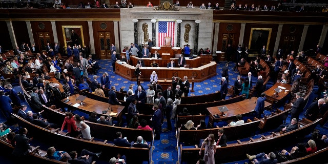 Members talk on the floor of the House Chamber on the opening day of the 118th Congress on Tuesday, January 3, 2023, at the U.S. Capitol in Washington DC. 