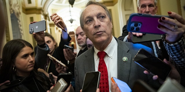 Representative Andy Biggs, a Republican from Arizona, speaks with members of the media in the House Chamber at the US Capitol in Washington, D.C. Wednesday, Jan. 4, 2023.