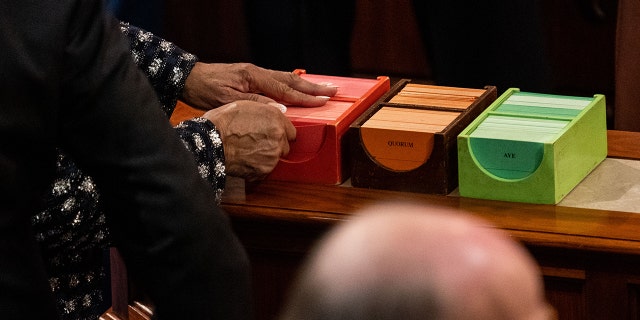 Members cast their votes on a motion to adjourn on the floor of the House Chamber of the U.S. Capitol Building on Friday, Jan. 6, 2023 in Washington, D.C. 