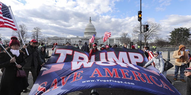 Former President Donald Trump's supporters gather on the second anniversary of the US Capitol riot in Washington DC, on January 6, 2023. 