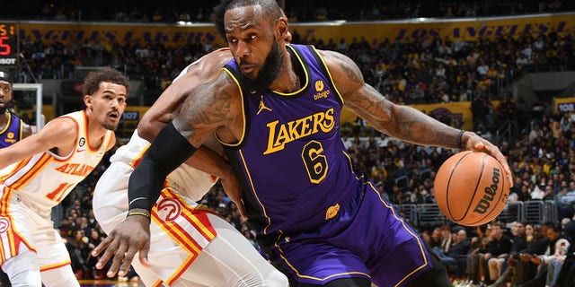 LeBron James #6 of the Los Angeles Lakers handles the ball during the game against the Atlanta Hawks on January 6, 2023, at Crypto.Com Arena in Los Angeles, California. 