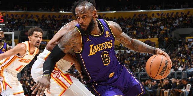 LeBron James #6 of the Los Angeles Lakers handles the ball during the game against the Atlanta Hawks on January 6, 2023 at Crypto.Com Arena in Los Angeles, California. 