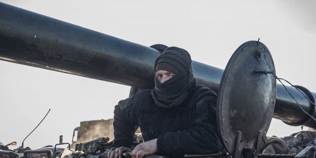 Ukrainian soldiers work with "pion" artillery in the northern direction of the Donbass front line in Donetsk, Ukraine, on Jan. 7, 2023.