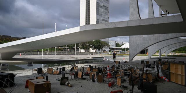 Partial view of one of entrance of Planalto Presidential Palace destroyed by supporters of Brazilian former President Jair Bolsonaro during an invasion, in Brasilia on January 9, 2023. (CARL DE SOUZA/AFP via Getty Images)