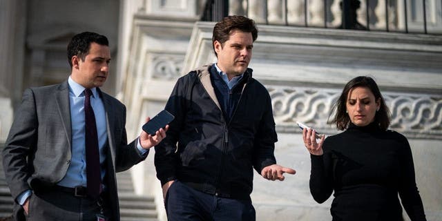 Rep. Matt Gaetz, R-Fla., talks with reporters as they walk down the steps of the House of Representatives at the U.S. Capitol in Washington, D.C., on Thursday.