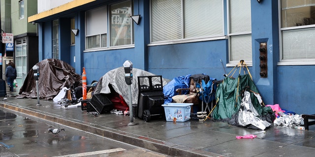 Homeless tents are seen near the Tenderloin District during rainy day in San Francisco on January 13, 2023, as atmospheric river storms hit California, United States. 