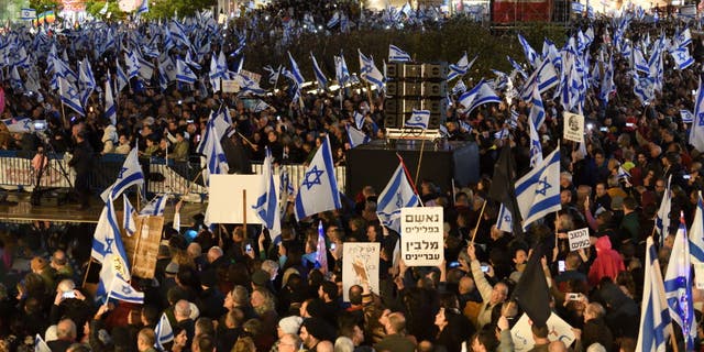 Israeli protesters rally against Prime Minister Benjamin Netanyahu's new government in Tel Aviv, January 14, 2023. (Gili Yaari/NurPhoto via Getty Images)