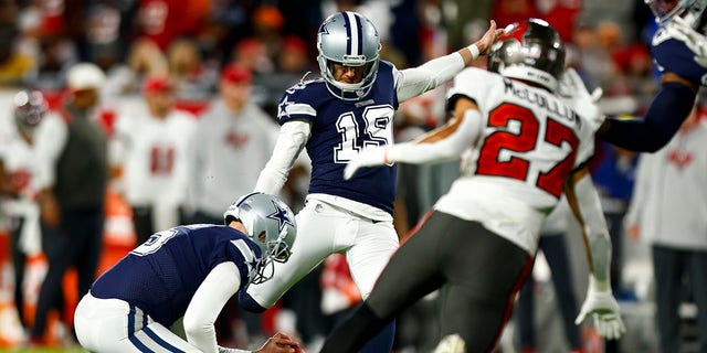 Brett Maher #19 of the Dallas Cowboys misses an extra point during the first quarter of an NFL Wild Card playoff football game against the Tampa Bay Buccaneers at Raymond James Stadium on January 16, 2023 in Tampa, Florida.