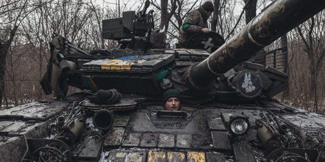 DONETSK OBLAST, UKRAINE - JANUARY 18: Ukrainian tankers carry out maintenance on their tanks on the Donbass frontline as military mobility continues within the Russian-Ukrainian war on January 18, 2023.