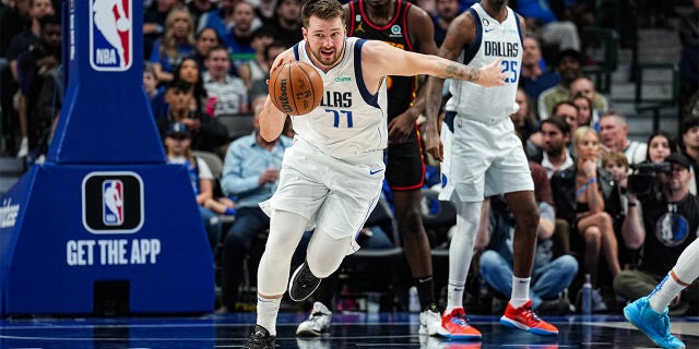 Luka Doncic of the Mavericks dribbles the ball against the Atlanta Hawks on Jan. 18, 2023, at the American Airlines Center in Dallas, Texas.