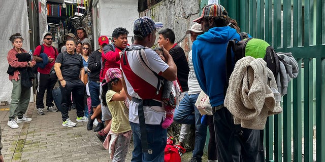 Tourists wait outside the Machu Picchu train station after rail service was suspended due to damage allegedly caused by protesters in Machu Picchu, Peru, on January 21, 2023. 