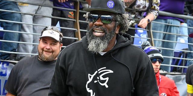 Ed Reed speaks to fans on the sidelines before the Baltimore Ravens game against the Cleveland Browns at M and T Bank Stadium in Baltimore on October 23, 2022.