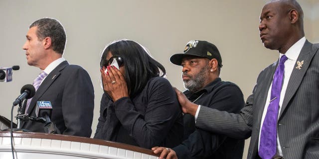 RowVaugn Wells, second from left, becomes emotional during a press conference at Mt. Olive Cathedral CME Church after she viewed footage of the violent police interaction that led to the death of her son Tyre Nichols in Memphis, Tennessee on Jan. 23, 2023.