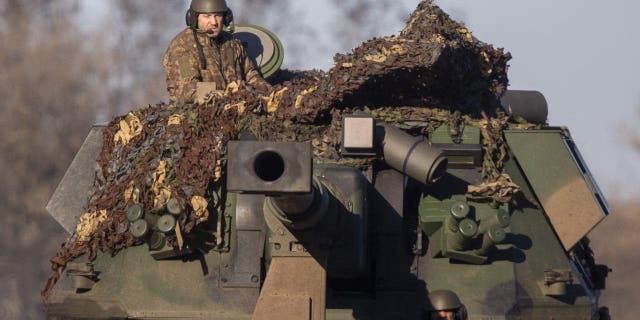 Ukrainian soldiers are seen on their ways to frontlines with their armoured military vehicles as the strikes continue on the Donbass frontline, during Russia and Ukraine war in Donetsk Oblast, Ukraine on Jan. 24, 2023. 