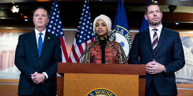 From left, Reps. Adam Schiff, D-Calif., Ilhan Omar, D-Minn., and Eric Swalwell, D-Calif., conduct a news conference on being removed from committees assignments, in the Capitol Visitor Center on Wednesday, January 25, 2023. 