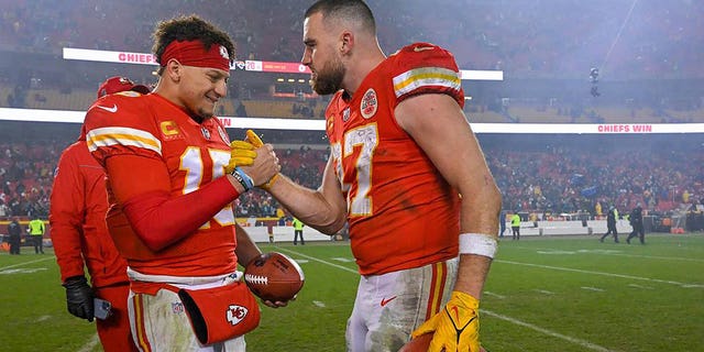 Kansas City Chiefs quarterback Patrick Mahomes, left, and tight end Travis Kelce celebrate a win over Jacksonville in the divisional round of the playoffs Saturday, Jan. 21, 2023, at GEHA Field at Arrowhead Stadium in Kansas City, Mo. 