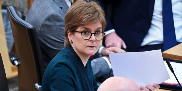First Minister Nicola Sturgeon awaits the start of First Minister's Questions in the Scottish Parliament Jan. 26, 2023, in Edinburgh, Scotland.