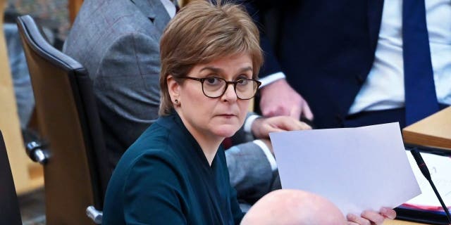 First Minister Nicola Sturgeon awaits the start of First Minister's Questions in the Scottish Parliament Jan. 26, 2023, in Edinburgh, Scotland. 