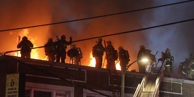 Firefighters battle fir inside a two-story apartment building in Westlake on Thursday, Jan. 26, 2023 in Los Angeles, CA.  
