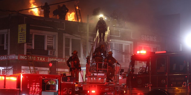 Firefighters battle fir inside a two-story apartment building in Westlake on Thursday, Jan. 26, 2023 in Los Angeles, CA.  
