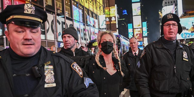 Police officers take demonstrators into custody during the protest against the police assault of Tyre Nichols at Times Square in New York on Jan. 27, 2023.