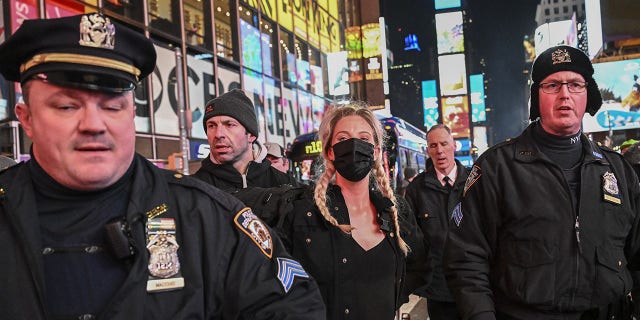 Police officers take demonstrators into custody during the protest against the police assault of Tyre Nichols at Times Square in New York on Jan. 27, 2023.