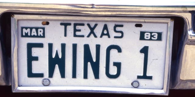 Numberplate on a car of the Ewing Family from the CBS primetime soap Dallas at The Cattle Barons Ball Sept. 24 1986 at Southfork Ranch, Dallas, Texas.