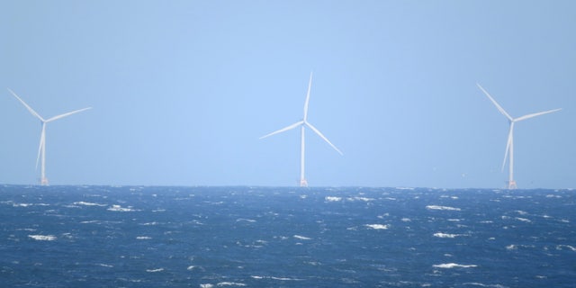 A wind farm is pictured off the coast from Montauk, New York, on April 16, 2021.