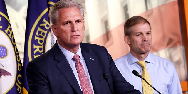 House Minority Leader Kevin McCarthy, joined by Rep. Jim Jordan, speaks at a news conference on July 21, 2021, in Washington, D.C.