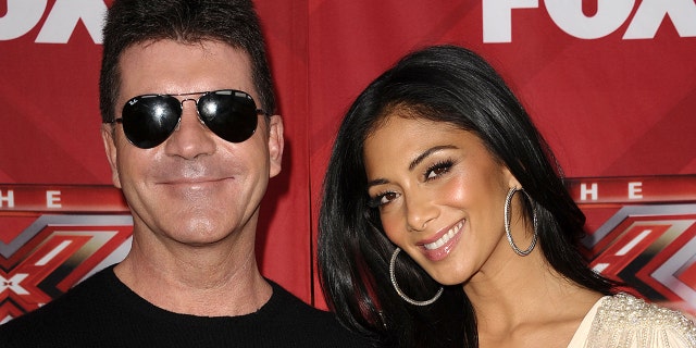 Simon Cowell and Nicole Scherzinger