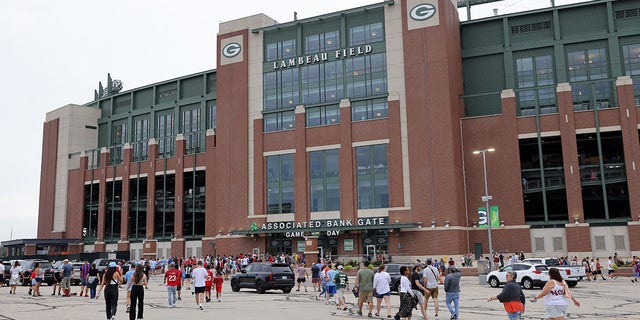 Fans arrive at Lambeau Field for a friendly pre-season match between Bayern Munich and Manchester City on July 23, 2022, in Green Bay, Wisconsin.