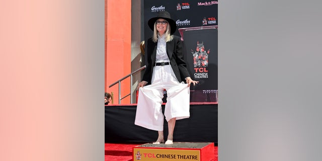 Diane Keaton is honored with a hand and footprint ceremony at the TCL Chinese Theater on August 11, 2022 in Hollywood, California.