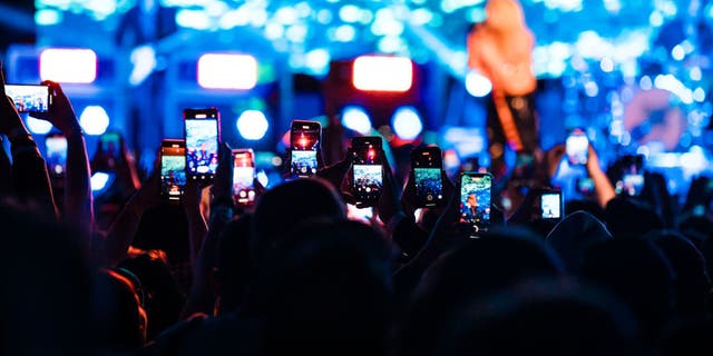 A general view of the crowd during Avril Lavigne's concert with smartphones at Espaco Unimed on September 7, 2022, in Sao Paulo, Brazil.