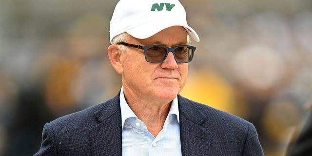 New York Jets owner Woody Johnson looks on before a game against the Pittsburgh Steelers at Acrisure Stadium on October 2, 2022 in Pittsburgh, Pennsylvania.