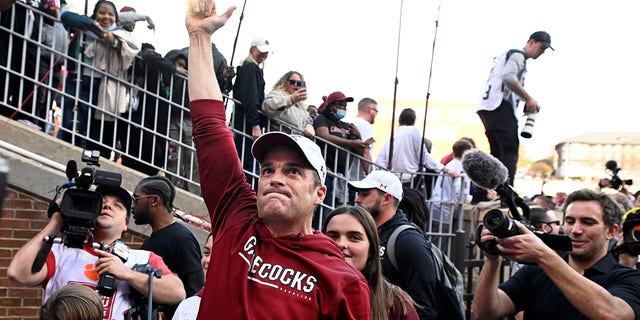Head coach Shane Beamer of the South Carolina Gamecocks celebrates after defeating the Clemson Tigers at Memorial Stadium on November 26, 2022 in Clemson, SC 