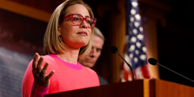 U.S. Sen. Kyrtsen Sinema, D-AZ, speaks at a news conference after the Senate passed the Respect for Marriage Act at the Capitol Building on November 29, 2022 in Washington, DC. In a 61-36 vote, the measure would provide federal recognition and protection for same-sex and interracial marriages. 