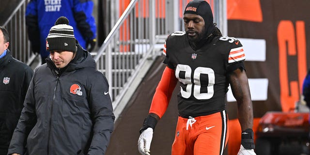 Cleveland Browns Jadeveon Clowney, #90 of the Cleveland Browns, leaves the game after being injured against the Baltimore Ravens during the first half at FirstEnergy Stadium on December 17, 2022 in Cleveland, Ohio. 