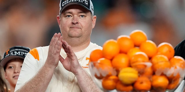 Head coach Josh Heupel of the Tennessee Volunteers celebrates onstage after defeating the Clemson Tigers in the Capital One Orange Bowl at Hard Rock Stadium on December 30, 2022 in Miami Gardens, Florida. 