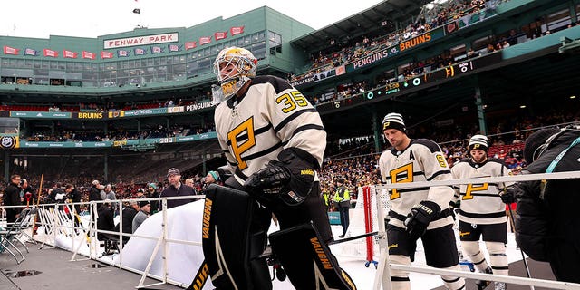 Tristan Jarry of the Pittsburgh Penguins takes the ice prior to playing the Bruins in the Winter Classic at Fenway Park on Jan. 2, 2023, in Boston.