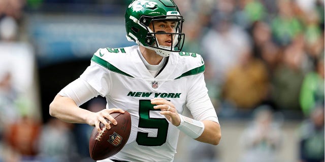 Mike White of the New York Jets looks to pass during the first quarter against the Seattle Seahawks at Lumen Field on January 1, 2023 in Seattle. 