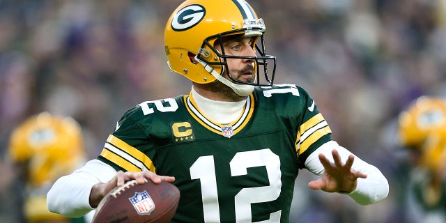 The Packers' Aaron Rodgers throws against the Minnesota Vikings at Lambeau Field on January 1, 2023 in Green Bay, Wisconsin.