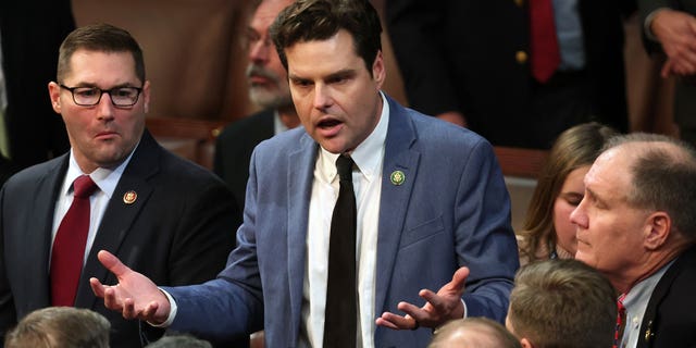 Rep.-elect Matt Gaetz talks to fellow members-elect during the second day of elections for speaker of the House at the U.S. Capitol on Jan. 4, 2023.