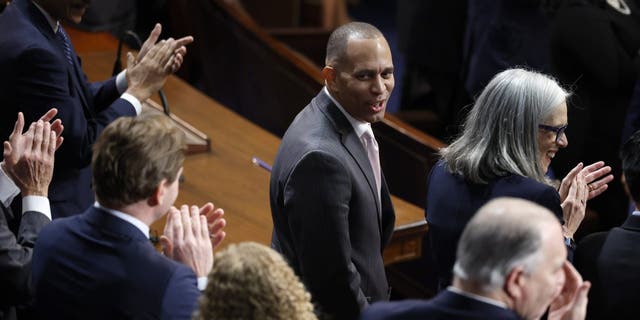 US House Democratic Leader Hakeem Jeffries, DN.Y., center, is acknowledged in the House chamber during the second day of elections for speaker of the House at the US Capitol Building Jan. 4, 2023, in Washington, DC 