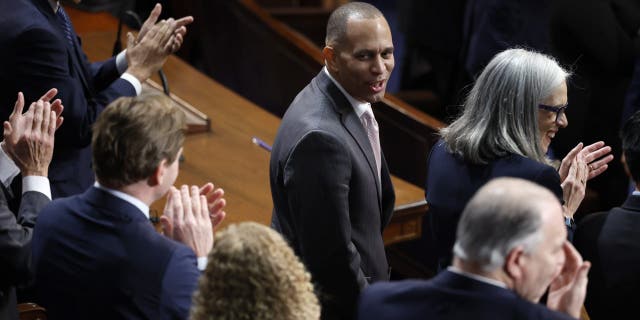 US House Democratic Leader Hakeem Jeffries, DN.Y., center, is acknowledged in the House chamber during the second day of elections for speaker of the House at the US Capitol Building Jan. 4, 2023, in Washington, DC 